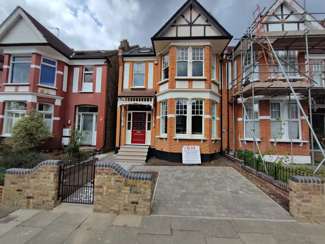Victorian tile pathway, Yorkstone steps and Tegual block paving driveway and brick walls Arkley, North London