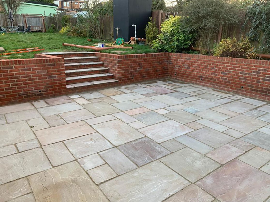 Indian Sandstone patio and brick wall Southgate, North London