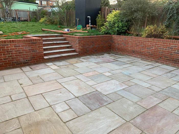 Indian Sandstone patio and brick wall Southgate, North London