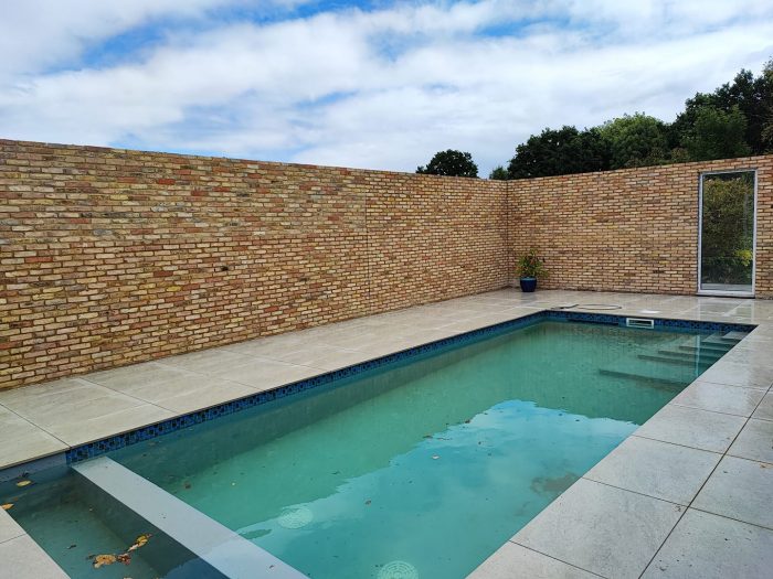 Porcelain tile patio and brick walls Totteridge and Whetstone, North London