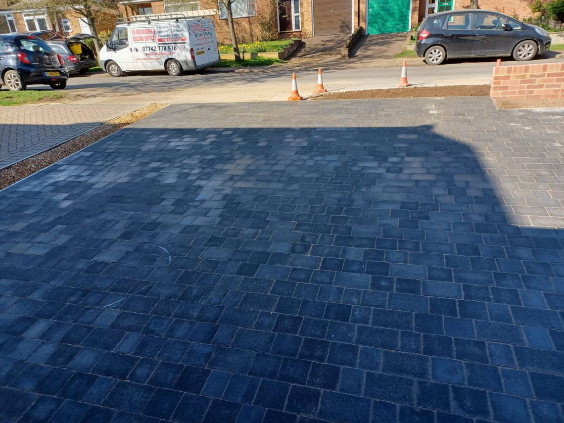 Tegula block paving driveway and brick walls Hertfordshire