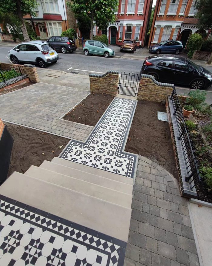 Victorian tile pathway, Yorkstone steps and Tegual block paving driveway and brick walls Arkley, North London