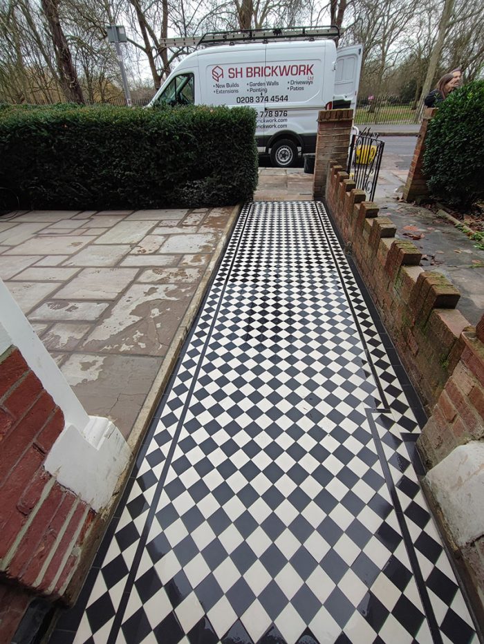 Victorian tile pathway and Yorkstone Queens Park, London